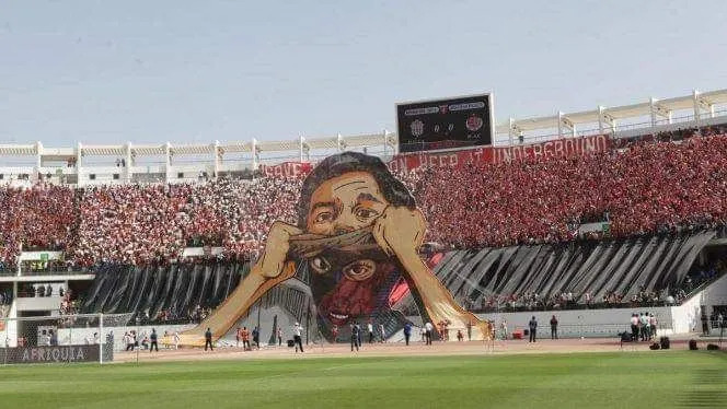 مغرب تايمز - "أولتراس ايمازيغن" تندد بأعمال "شغب" ملعب أدرار