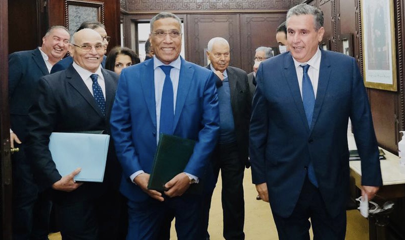 مغرب تايمز - تحقيق : فضائح جولات الحوار الإجتماعي لأخنوش مع النقابات المركزية