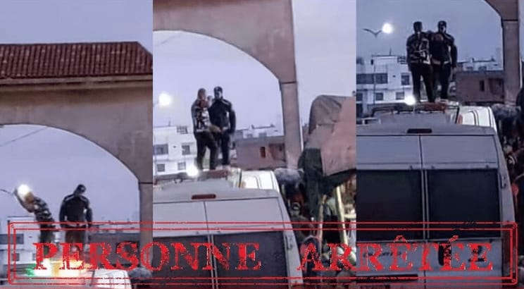 مغرب تايمز - شخص يعتلي سطح سيارة الشرطة ويتسببُ في فوضى عارمة